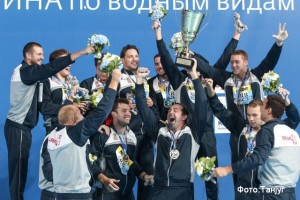 Members of Serbian water polo team celebrate with their gold medals and a cup after winning the men's water polo gold medal match against Croatia at the Swimming World Championships in Kazan, Russia, Saturday, Aug. 8, 2015. Serbia defeated Croatia by 11-4. (AP Photo/Denis Tyrin)